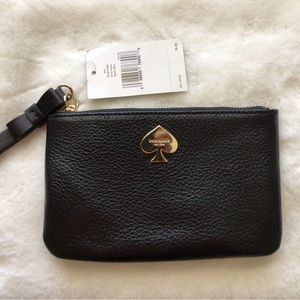 This is an adorable Kate Spade wristlet.